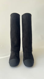 Chanel’s 2024 Métiers d’Art collection high-knee suede and leather combo Chanel logo on top